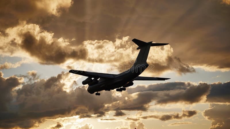 Airliner landing in golden light